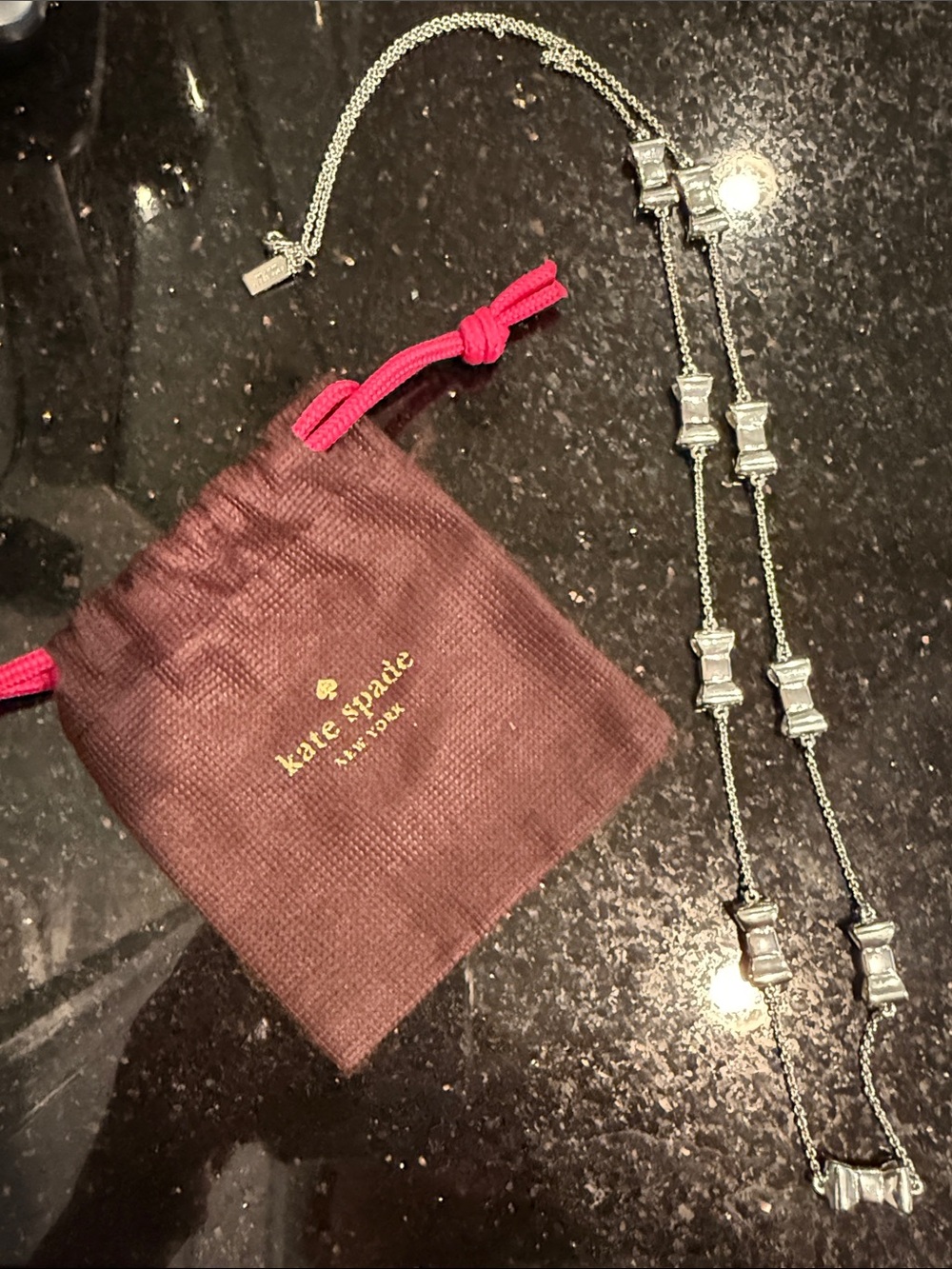 Kate Spade long Bow Necklace in Silver
